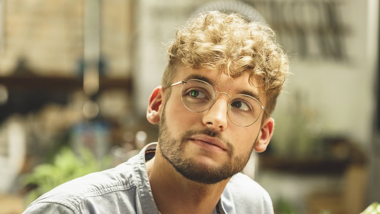 Young man looking interested.